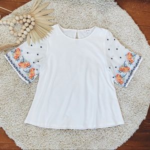 Bohemian Floral Blouse with Embroidered Sleeves